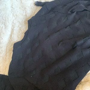 Longsleeve bodysuit.